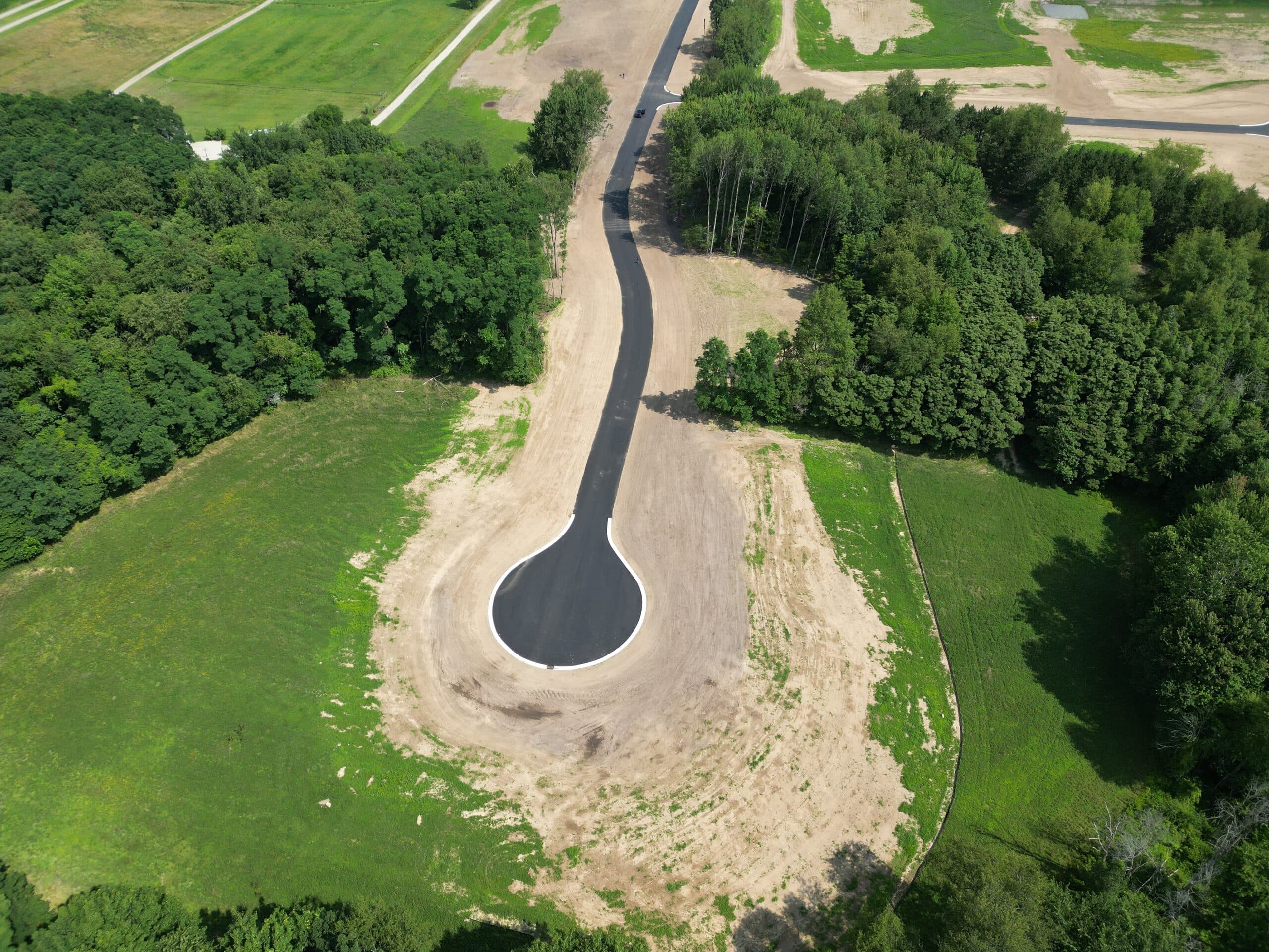 Aerial view of the track loop framed by open fields