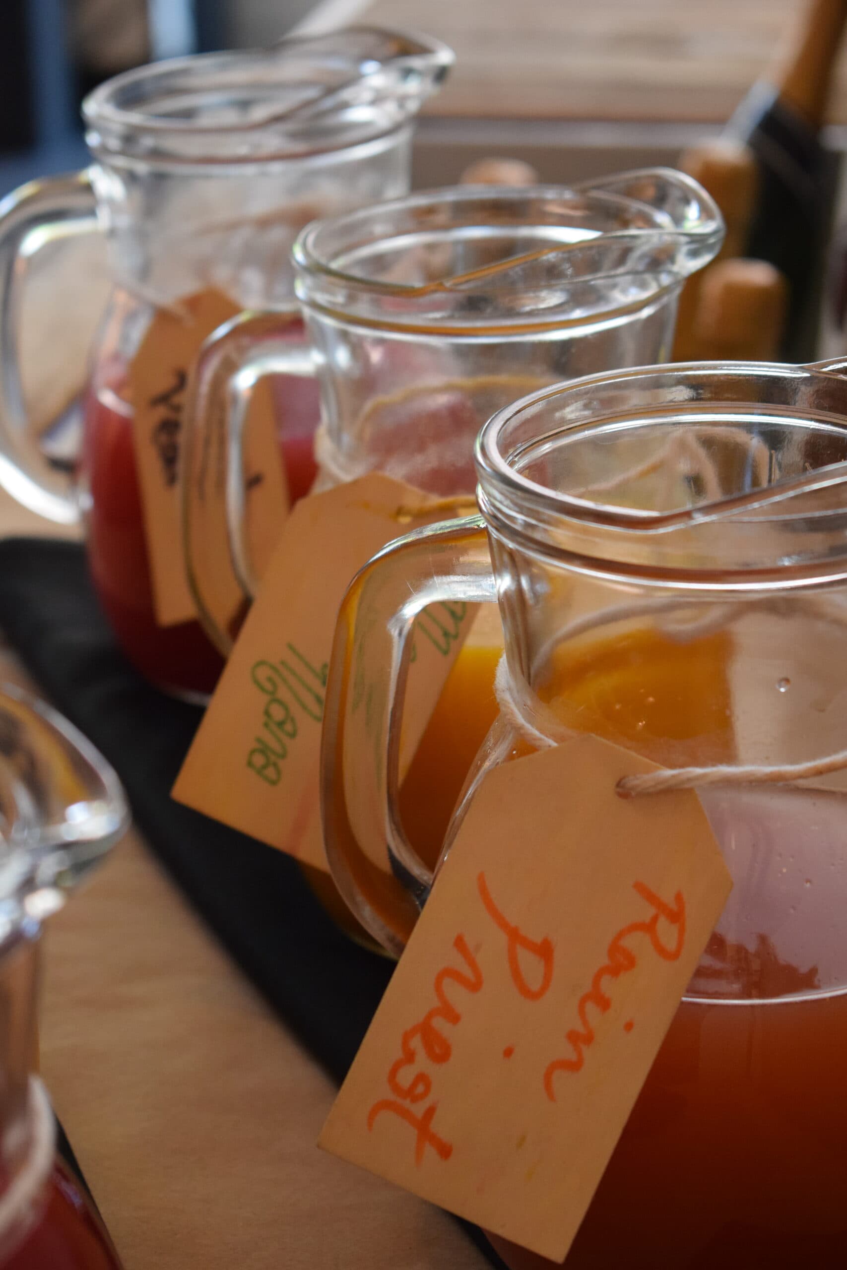 Iced tea pitchers with handwritten tags